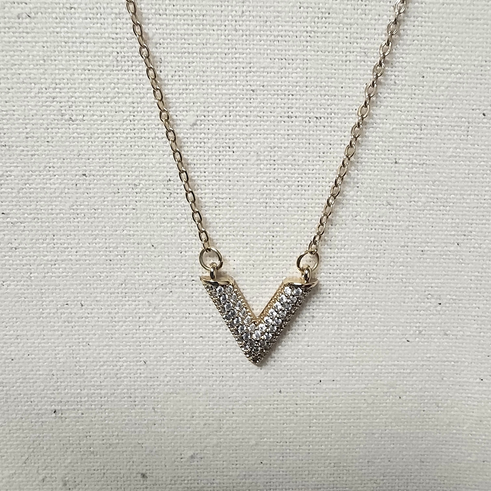 Gold and Silver V Pendant Necklace. Vuiton